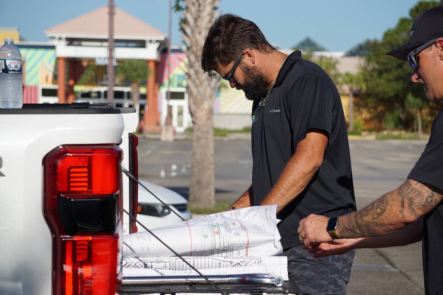 Landscape company maintaining shopping plaza in Delray Beach, FL