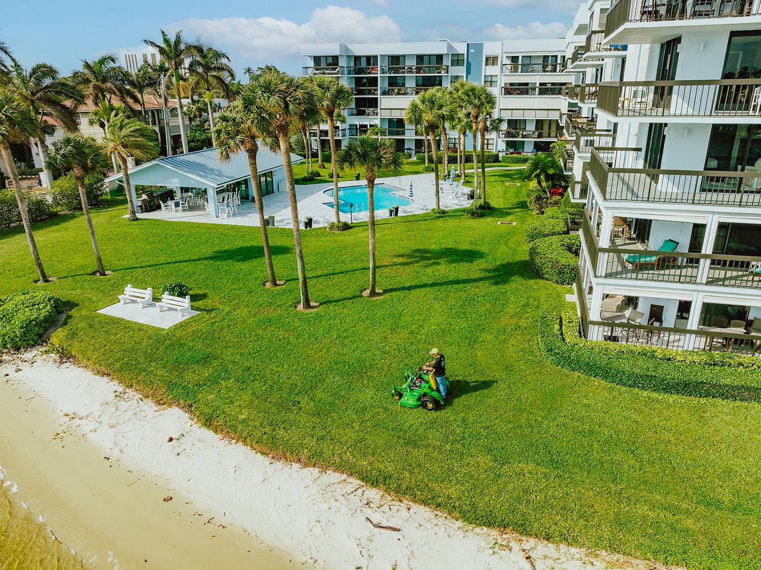 Lawn maintenance at waterfront condominium property in Boca Raton FL