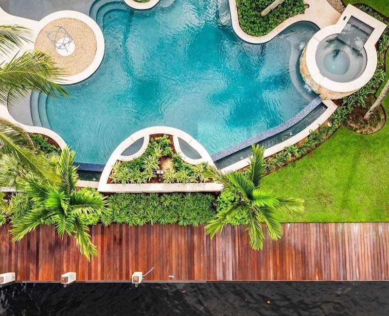 Tropical estate landscape with irrigation system and drainage solutions in Wellington, FL-1-1